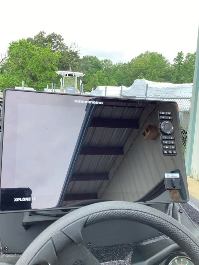Slide: The Image of 2026 Skeeter ZXE21 with Humminbird Xplore 12 display in cockpit. - 43