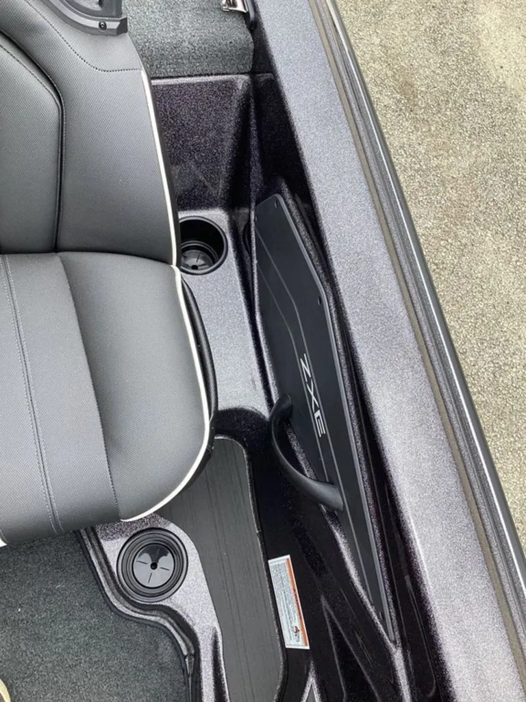 Slide: The Image of Interior of a 2026 Skeeter ZXE21 boat with gray seating. - 45