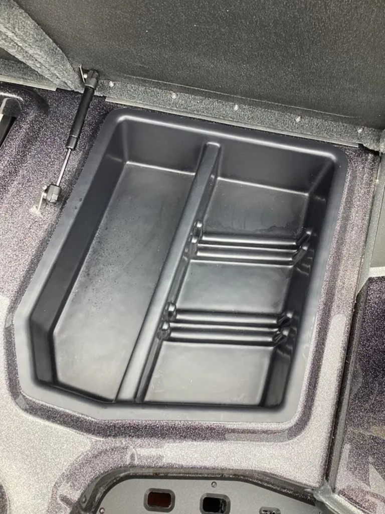 Slide: The Image of Interior of a 2026 Skeeter ZXE21 boat with storage compartment. - 47