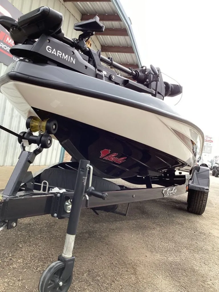 Slide: The Image of 2026 Bass Cat Cougar FTD SP boat on trailer, Garmin equipment. - 15