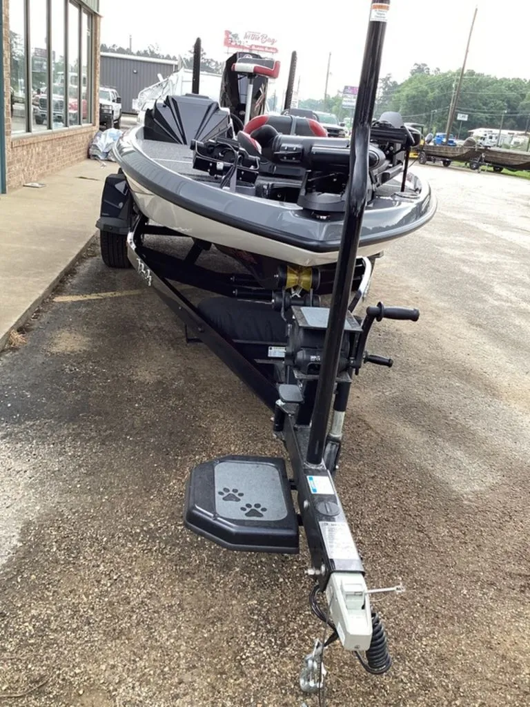 Slide: The Image of 2026 Bass Cat Cougar FTD SP parked on trailer. - 17