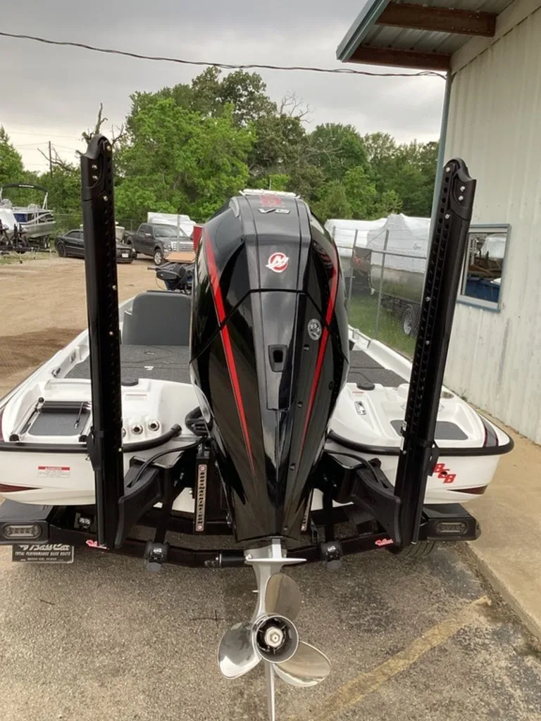 Slide: The Image of 2026 Bass Cat Cougar FTD SP boat with outboard motor. - 3