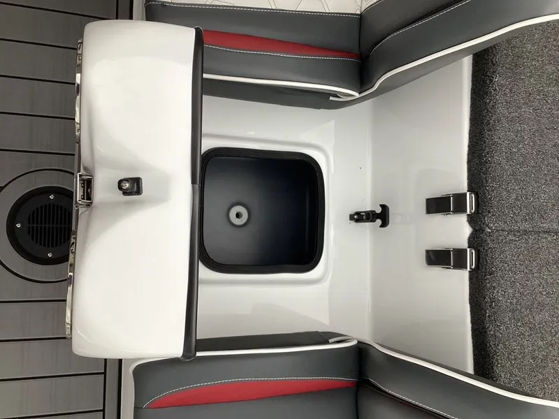 Slide: The Image of Interior of 2026 Bass Cat Cougar FTD SP with storage compartment. - 36