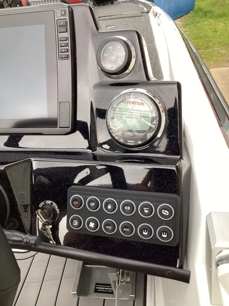 Slide: The Image of Dashboard of 2026 Bass Cat Cougar FTD SP with controls. - 43