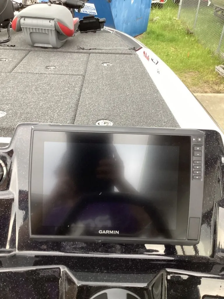 Slide: The Image of 2026 Bass Cat Cougar FTD SP with Garmin display on dashboard. - 47