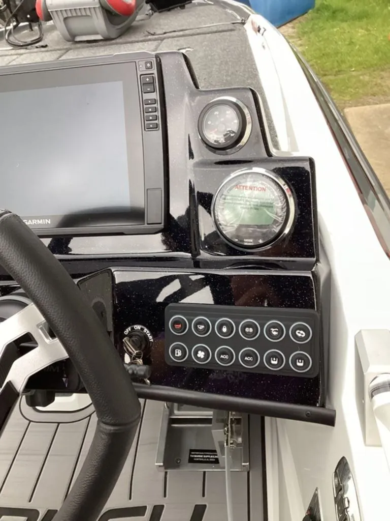Slide: The Image of Dashboard of 2026 Bass Cat Cougar FTD SP with Garmin display. - 48