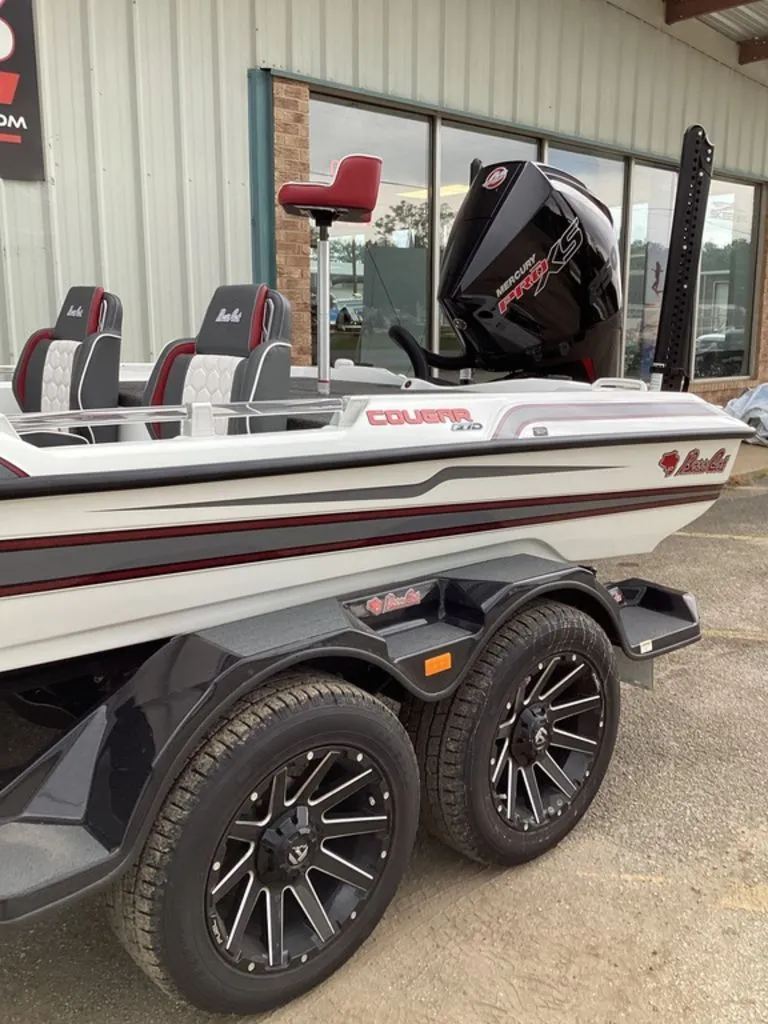 Slide: The Image of 2026 Bass Cat Cougar FTD SP boat with trailer and motor. - 9