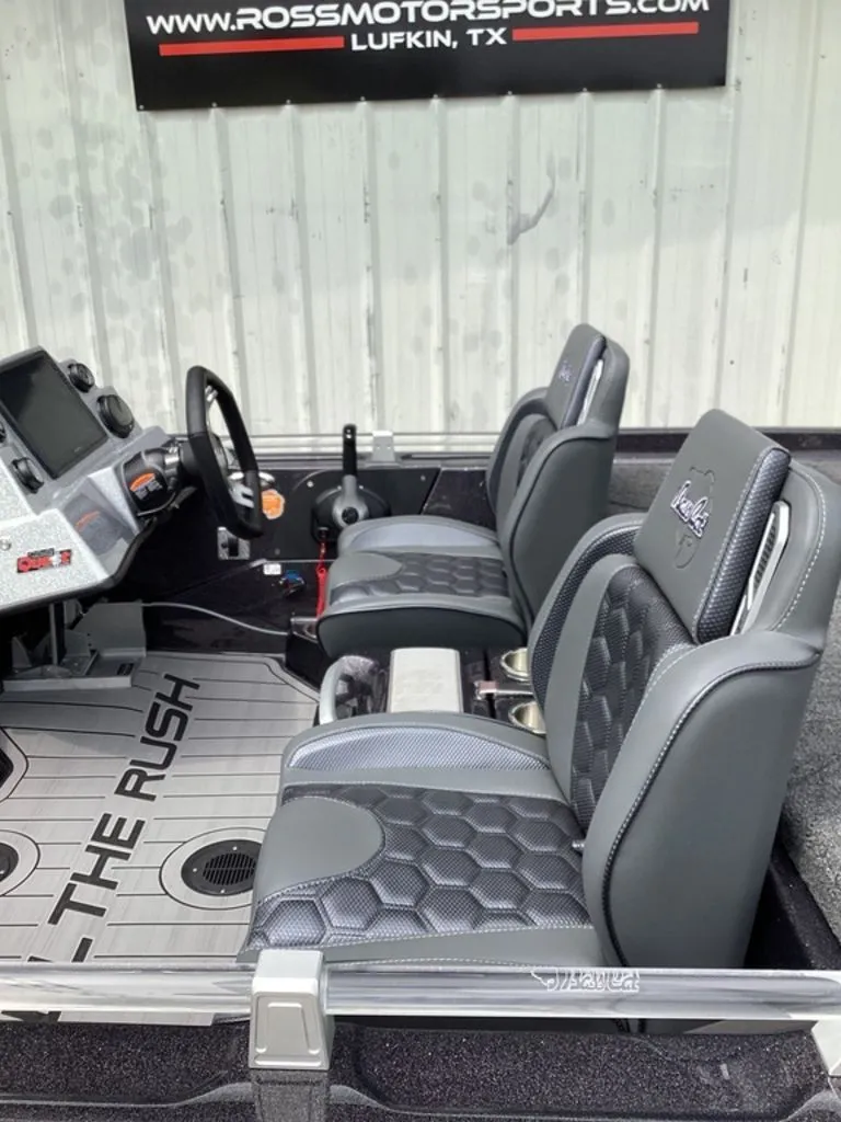 Slide: The Image of Interior of 2026 Bass Cat Cougar FTD SP with gray seats. - 12