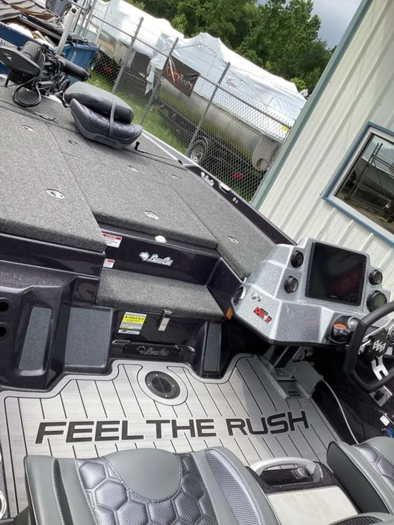 Slide: The Image of Interior of 2026 Bass Cat Cougar FTD SP with "Feel the Rush" flooring. - 13