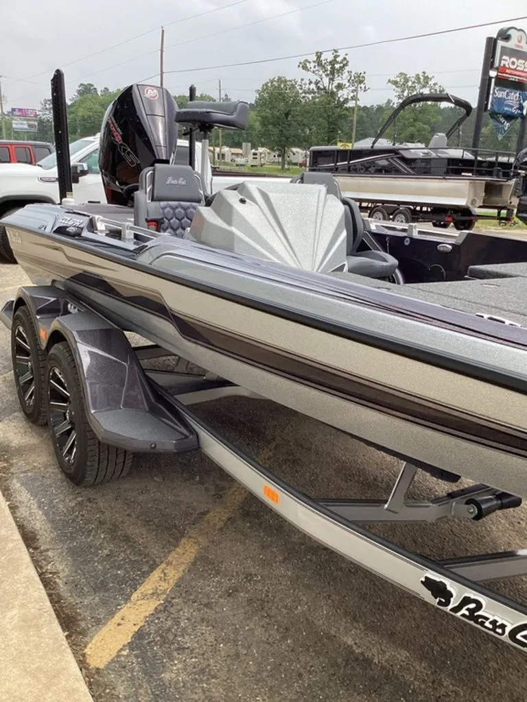 Slide: The Image of 2026 Bass Cat Cougar FTD SP boat parked on trailer. - 22