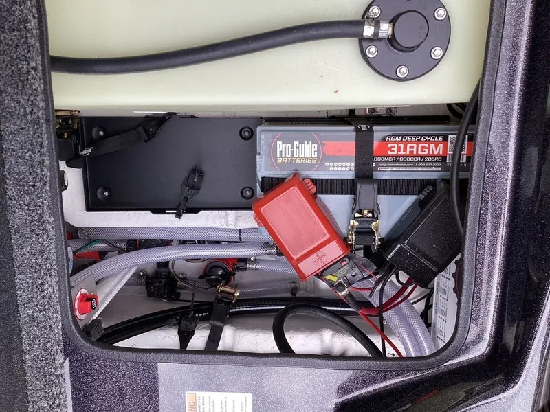 Slide: The Image of Bass Cat Cougar FTD SP 2026 battery compartment with AGM Deep Cycle battery. - 27