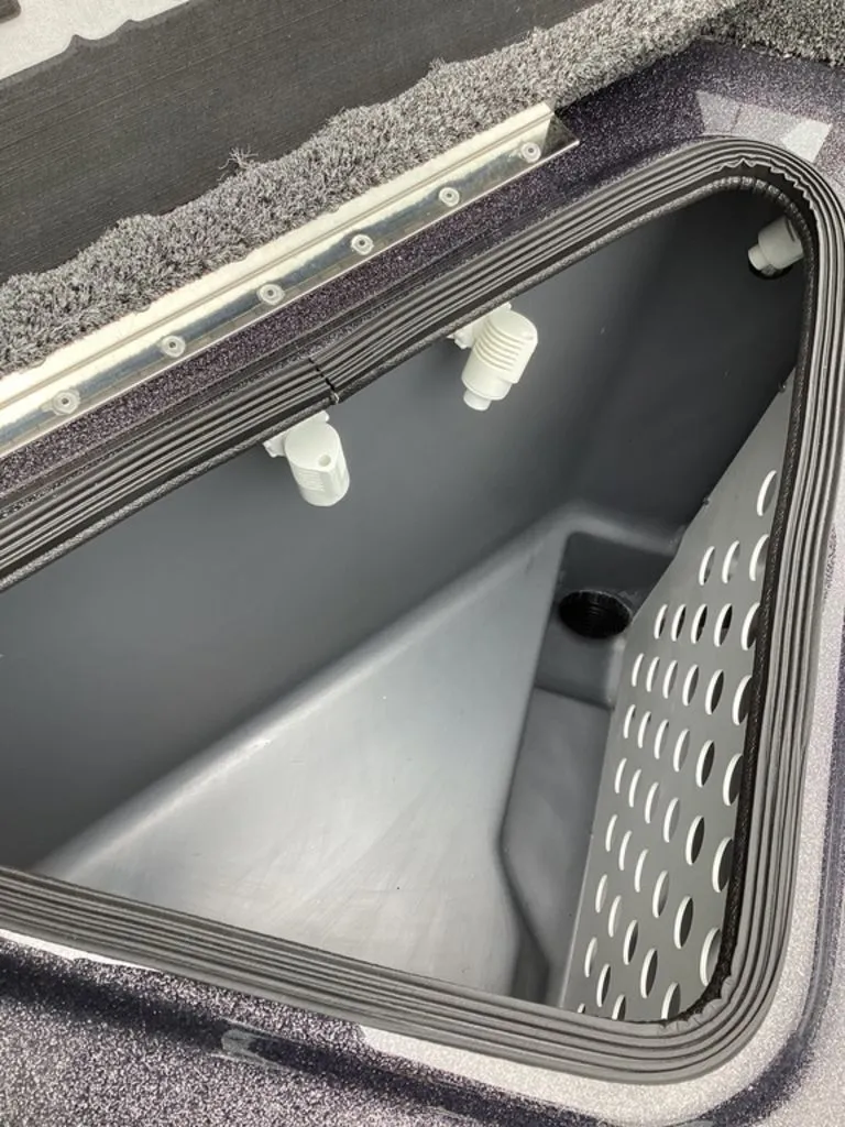 Slide: The Image of Bass Cat Cougar FTD SP 2026 storage compartment with ventilation holes. - 35