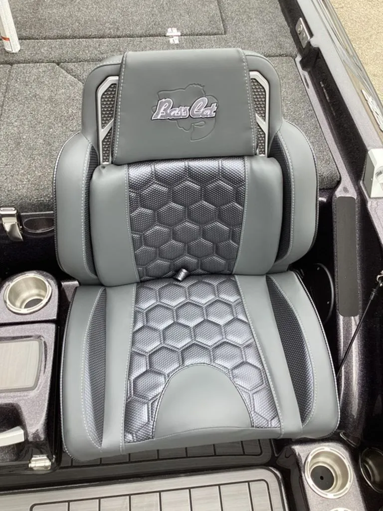 Slide: The Image of 2026 Bass Cat Cougar FTD SP seat with hexagonal pattern and logo. - 42