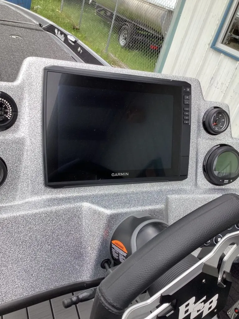 Slide: The Image of 2026 Bass Cat Cougar FTD SP boat console with Garmin display. - 48