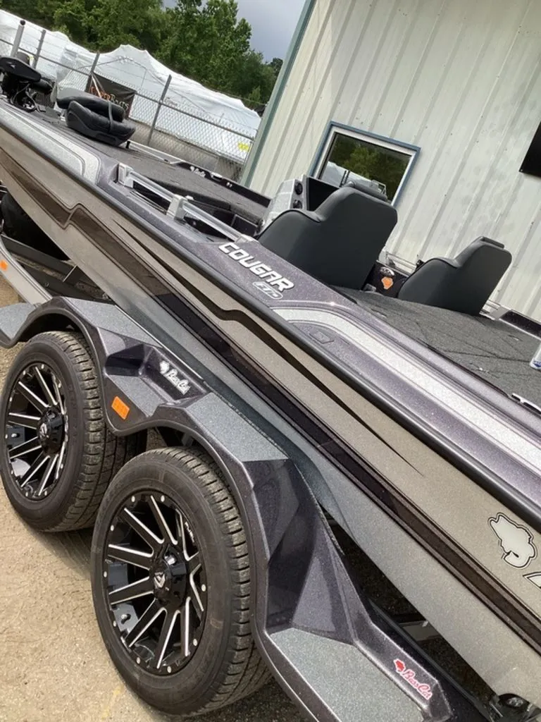 Slide: The Image of 2026 Bass Cat Cougar FTD SP boat on trailer. - 8