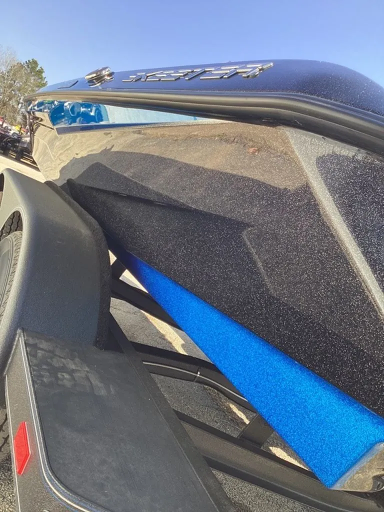 Slide: The Image of 2026 Skeeter ZXE21 boat on trailer, close-up view. - 12