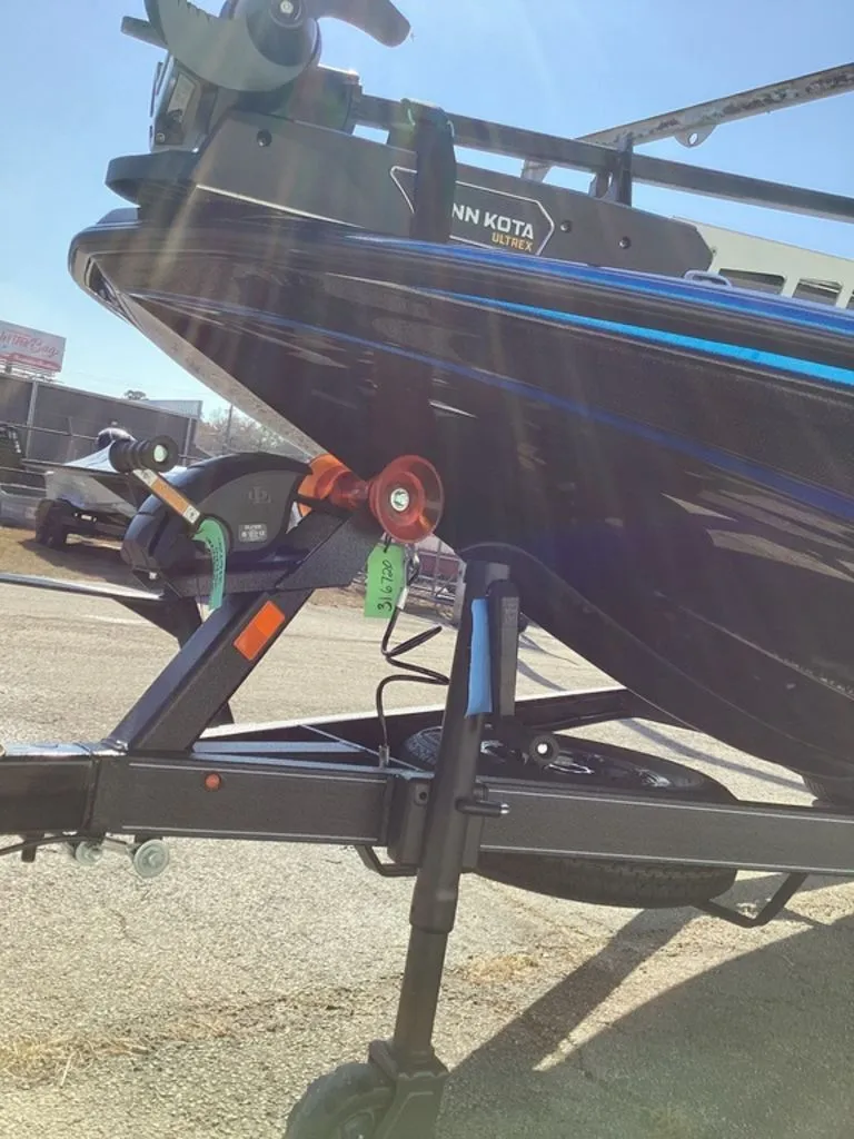 Slide: The Image of Skeeter ZXE21 2026 boat on trailer in sunlight. - 18