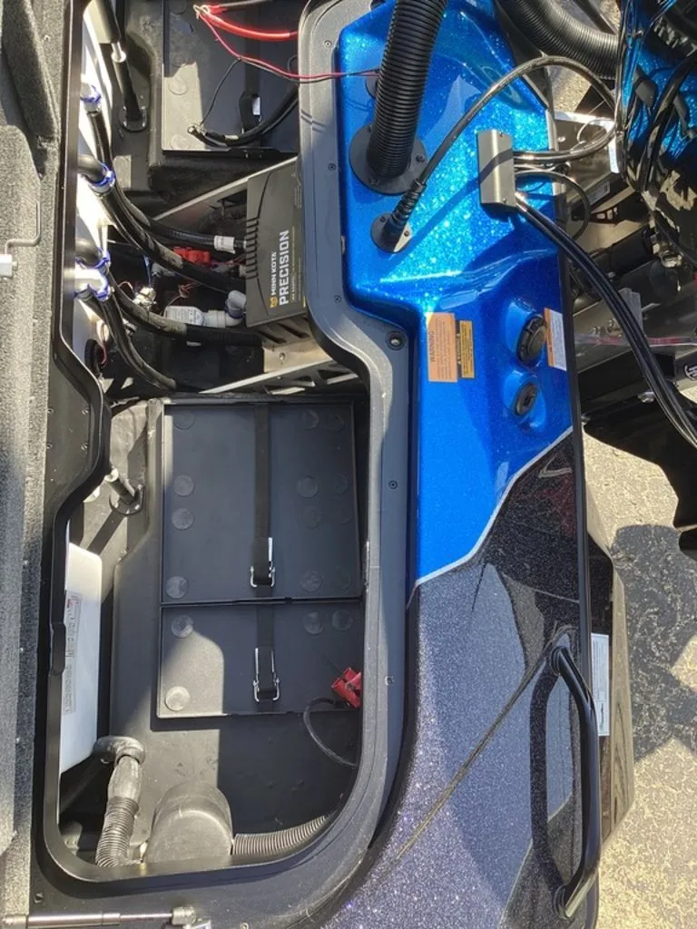 Slide: The Image of Interior view of Skeeter ZXE21 2026 with battery and wiring. - 27