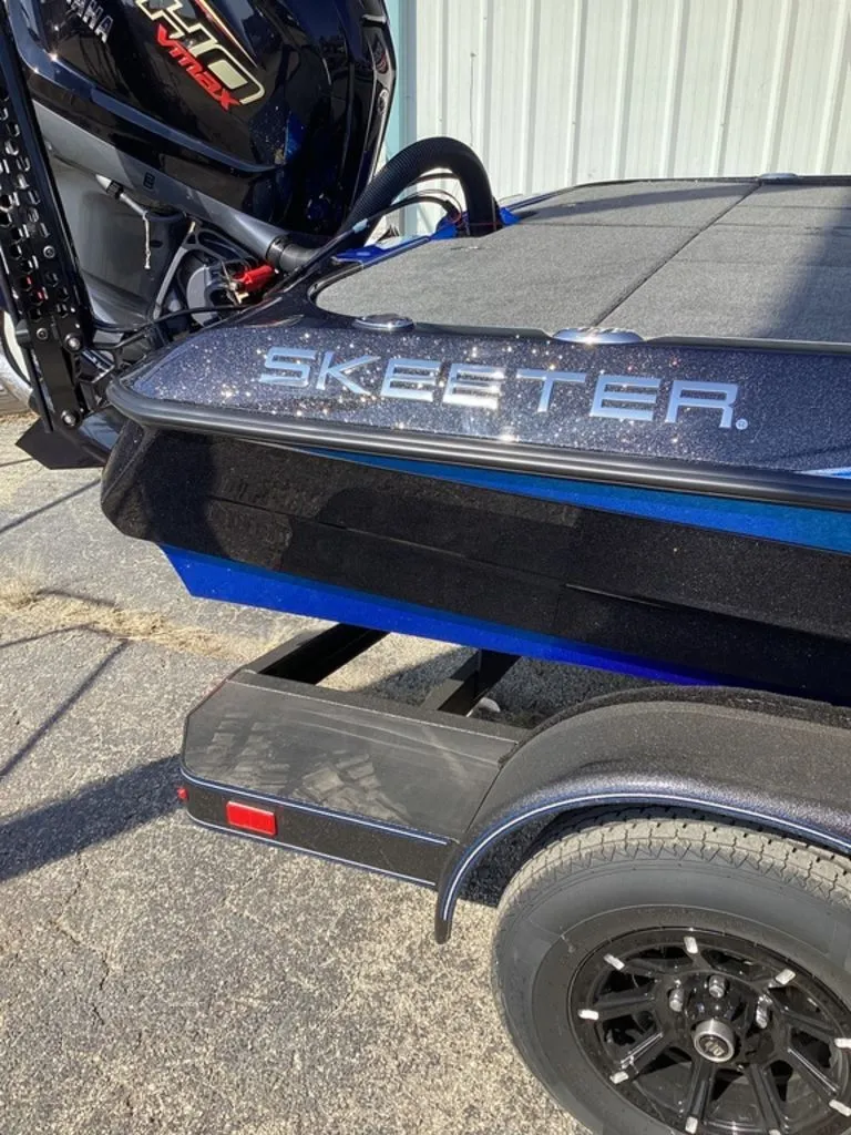 Slide: The Image of 2026 Skeeter ZXE21 boat with powerful outboard motor. - 3