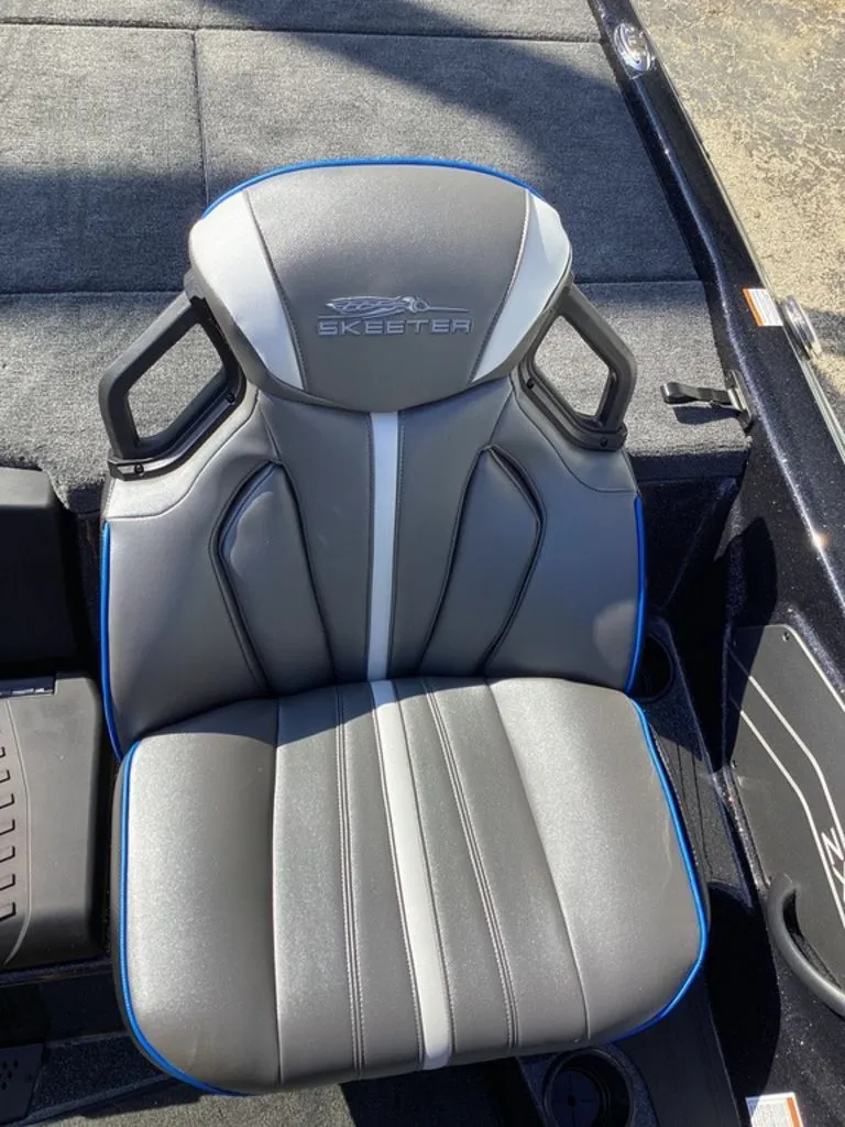 Slide: The Image of Skeeter ZXE21 boat seat, gray with blue accents, 2026 model. - 34