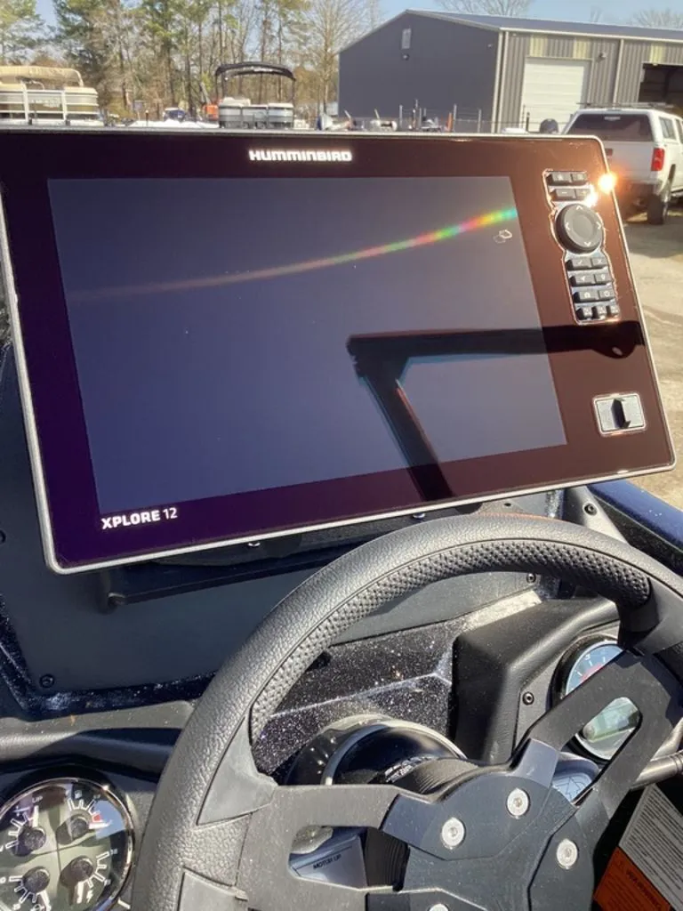 Slide: The Image of Skeeter ZXE21 2026 with Humminbird Xplore 12 display in cockpit. - 40