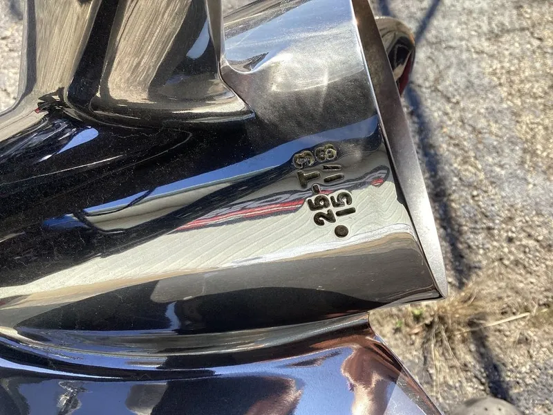 Slide: The Image of Close-up of a shiny Skeeter ZXE21 boat propeller, year 2026. - 5