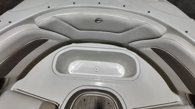 Slide: The Image of Interior of a 2007 Crownline 240 LS boat with seating area. - 12