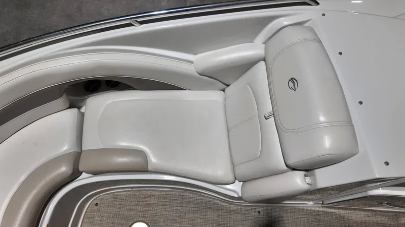 Slide: The Image of Interior of a 2007 Crownline 240 LS boat with white seating. - 13