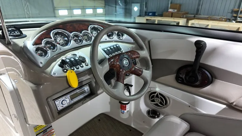 Slide: The Image of Interior view of 2007 Crownline 240 LS boat cockpit. - 18
