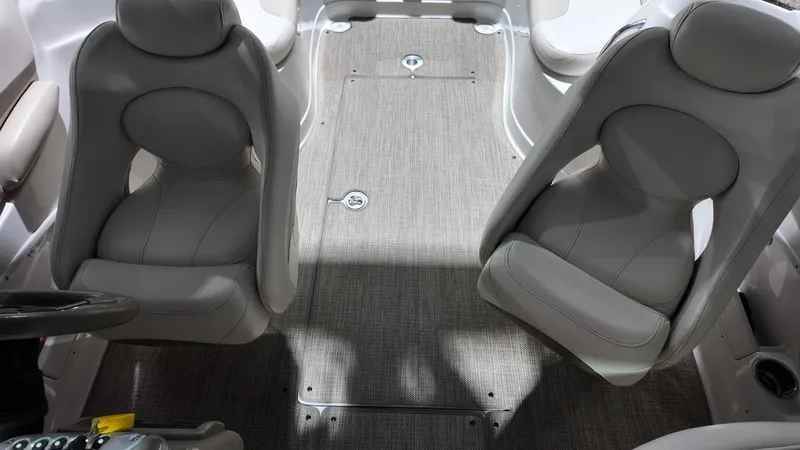 Slide: The Image of Interior of a 2007 Crownline 240 LS boat with gray seats. - 23