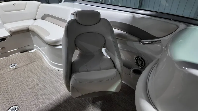 Slide: The Image of Interior of a 2007 Crownline 240 LS boat with gray seating. - 25