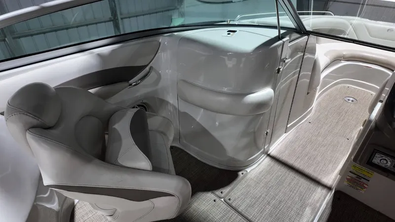 Slide: The Image of Interior of a 2007 Crownline 240 LS boat, gray upholstery. - 26