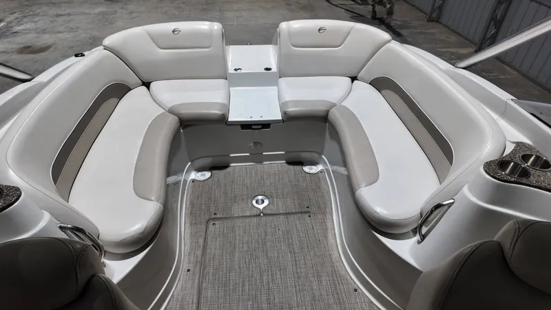Slide: The Image of Interior of a 2007 Crownline 240 LS boat with beige seating. - 29