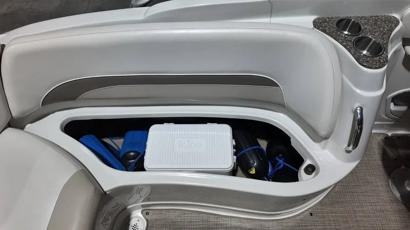 Slide: The Image of Interior of 2007 Crownline 240 LS with storage and cooler. - 30