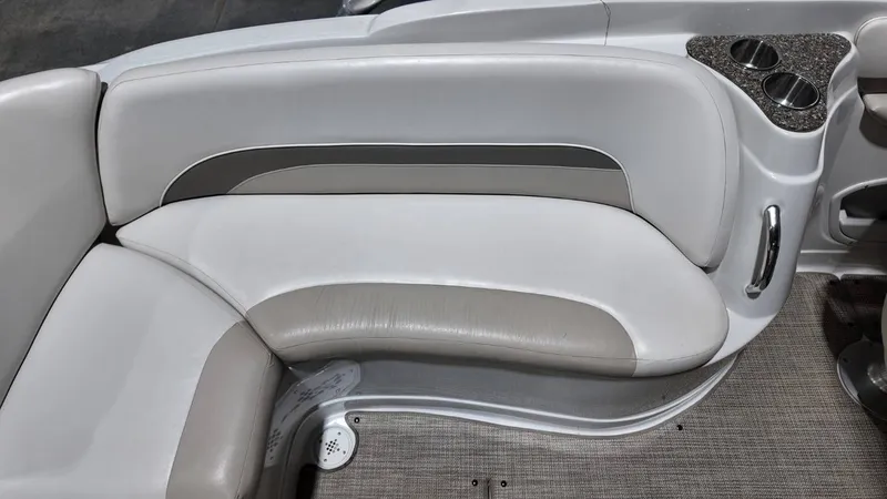 Slide: The Image of Interior of 2007 Crownline 240 LS boat with seating and cup holders. - 31