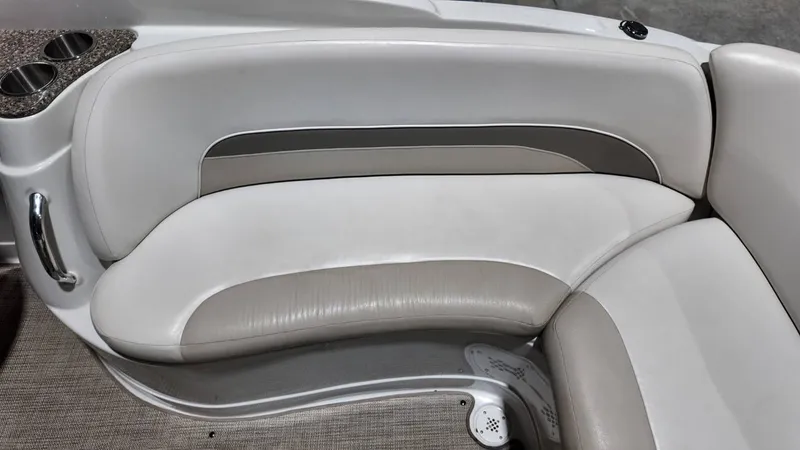 Slide: The Image of Interior of a 2007 Crownline 240 LS boat with gray upholstery. - 32