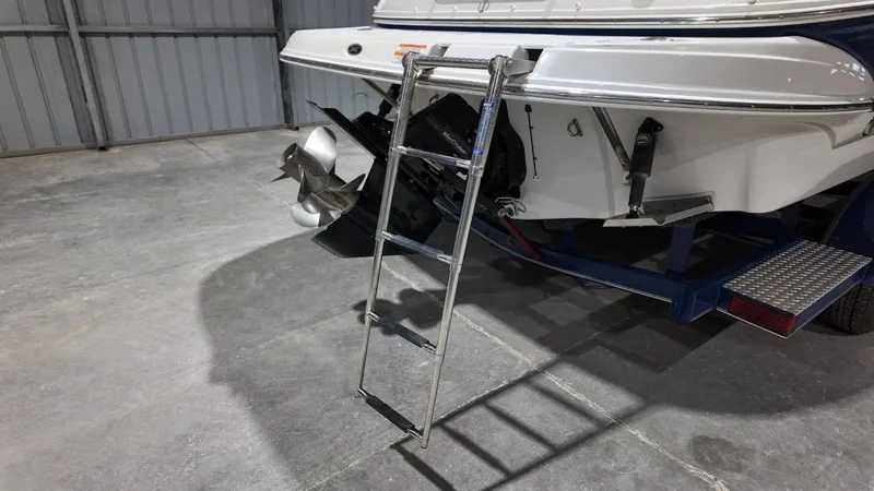 Slide: The Image of Rear view of a 2007 Crownline 240 LS with ladder. - 5