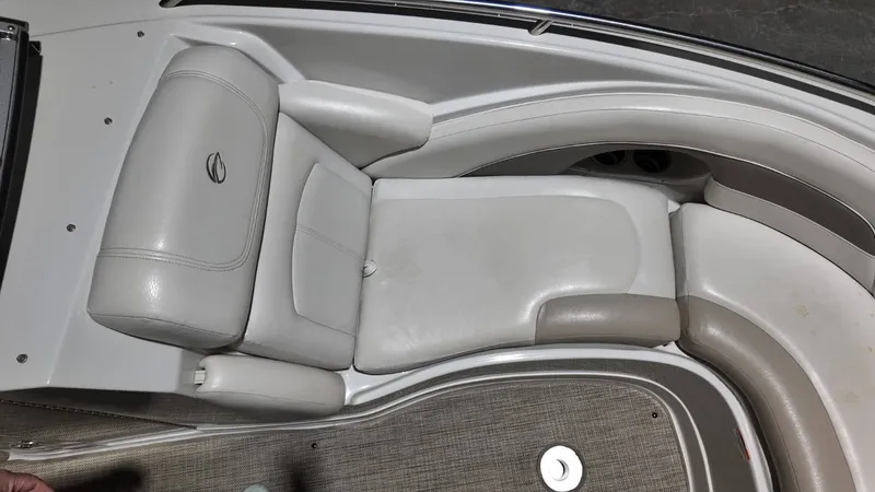 Slide: The Image of Interior of a 2007 Crownline 240 LS boat with gray leather seats. - 9