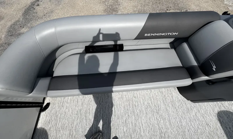 Slide: The Image of 2025 Bennington S20 boat seat with gray upholstery. - 13