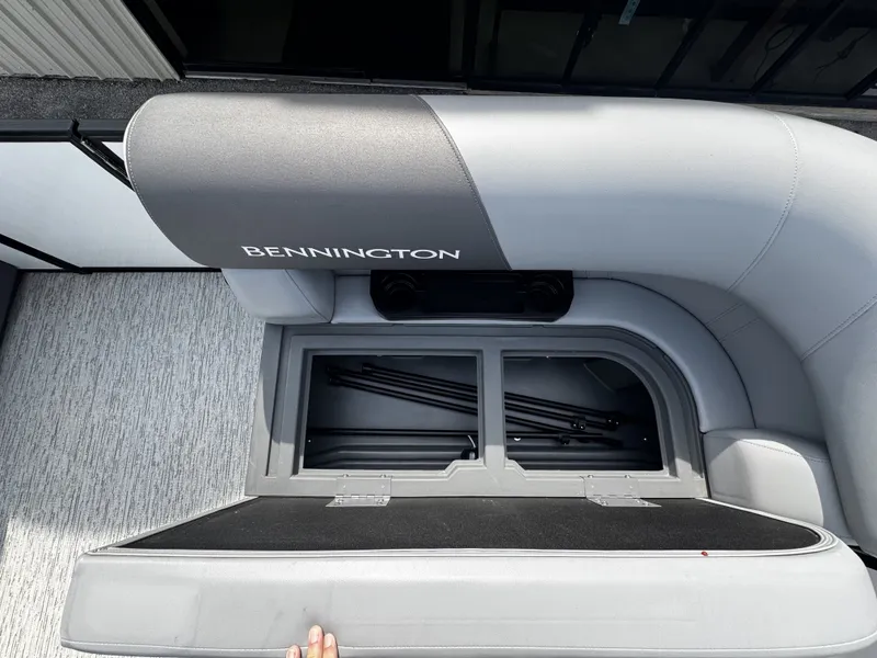 Slide: The Image of Bennington S20 2025 seat with storage compartment, gray upholstery. - 16