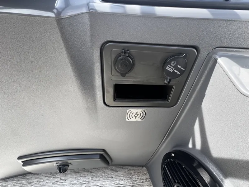 Slide: The Image of 2025 Bennington S20 boat console with USB and 12V ports. - 22