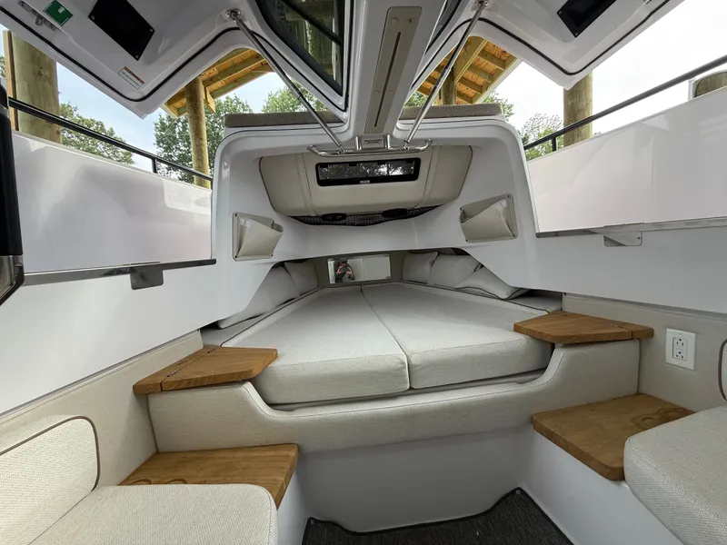 Slide: The Image of Interior of 2025 Axopar 37 XC Cross Cabin with cozy bed. - 9