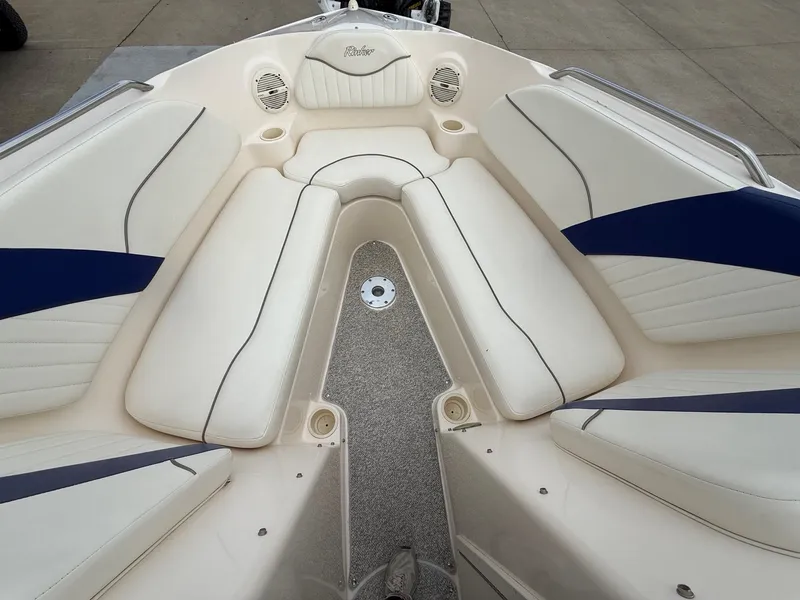Slide: The Image of Interior view of a 2004 Rinker 262 Captiva Bowrider boat. - 10
