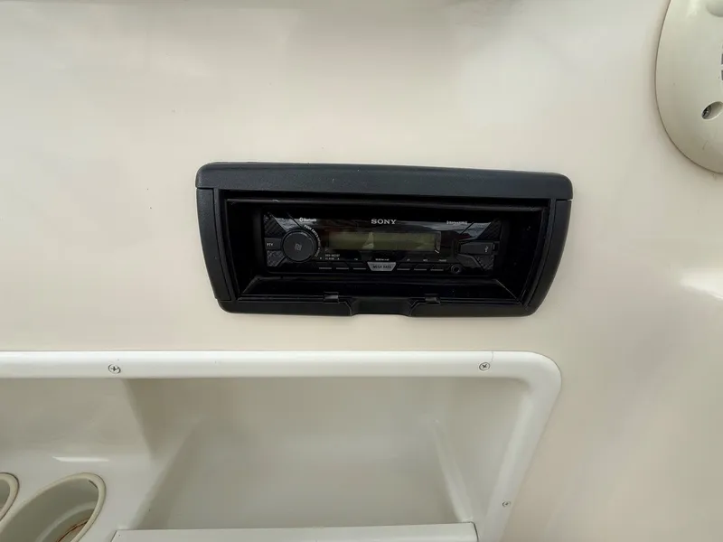 Slide: The Image of Sony radio in 2004 Rinker 262 Captiva Bowrider boat. - 19