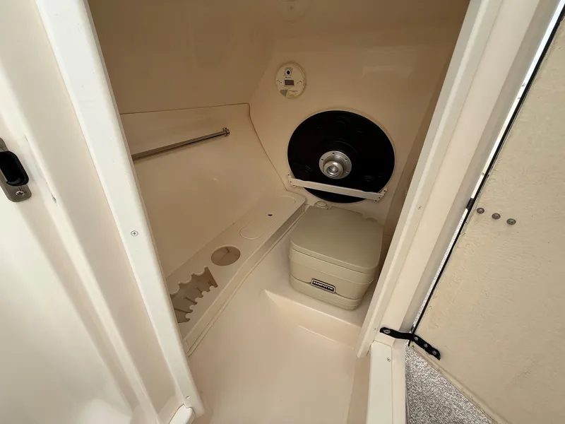 Slide: The Image of Interior of 2004 Rinker 262 Captiva Bowrider with toilet. - 20