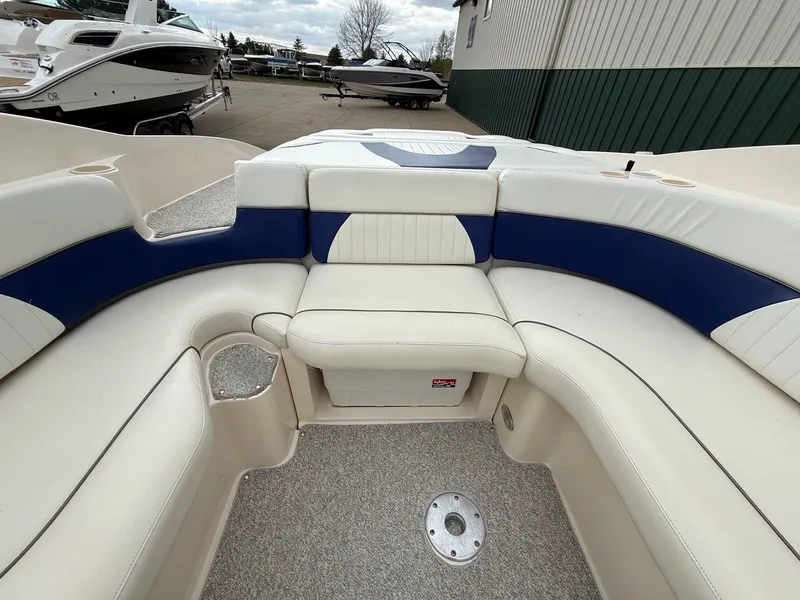 Slide: The Image of Interior view of a 2004 Rinker 262 Captiva Bowrider boat. - 22
