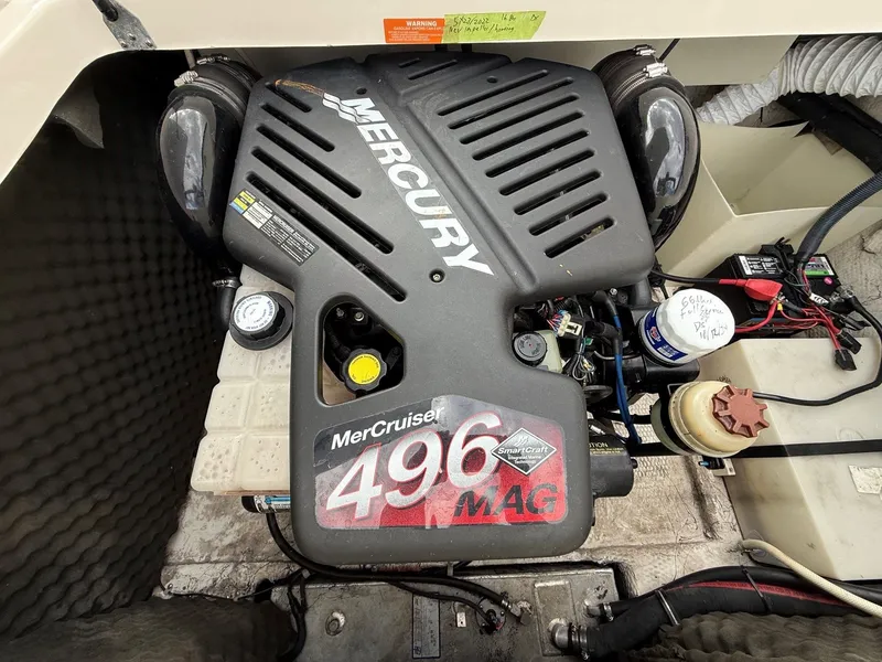Slide: The Image of Engine of a 2004 Rinker 262 Captiva Bowrider with MerCruiser 496 MAG. - 25