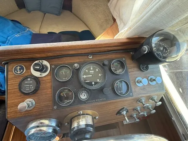 Slide: The Image of Dashboard of a 1979 Tollycraft 26 boat with Volvo Penta instruments. - 18