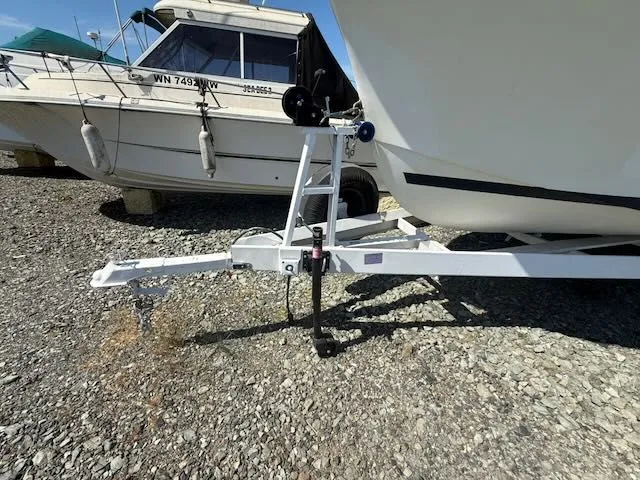 Slide: The Image of 1979 Tollycraft 26 on trailer, side view. - 26