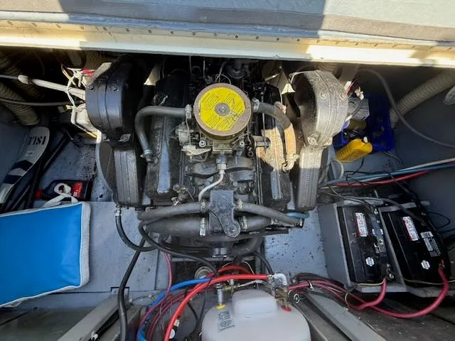 Slide: The Image of Engine compartment of a 1979 Tollycraft 26 boat with visible batteries. - 5